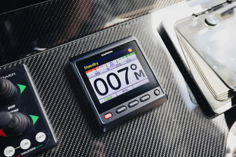  Yacht Photos Pics Garmin display on 2021 Midnight Express 43 Open boat dashboard with carbon fiber finish.