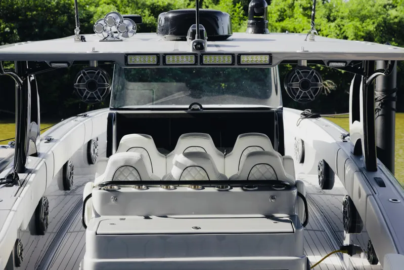  Yacht Photos Pics 2021 Midnight Express 43 Open boat interior with modern seating and advanced audio system.