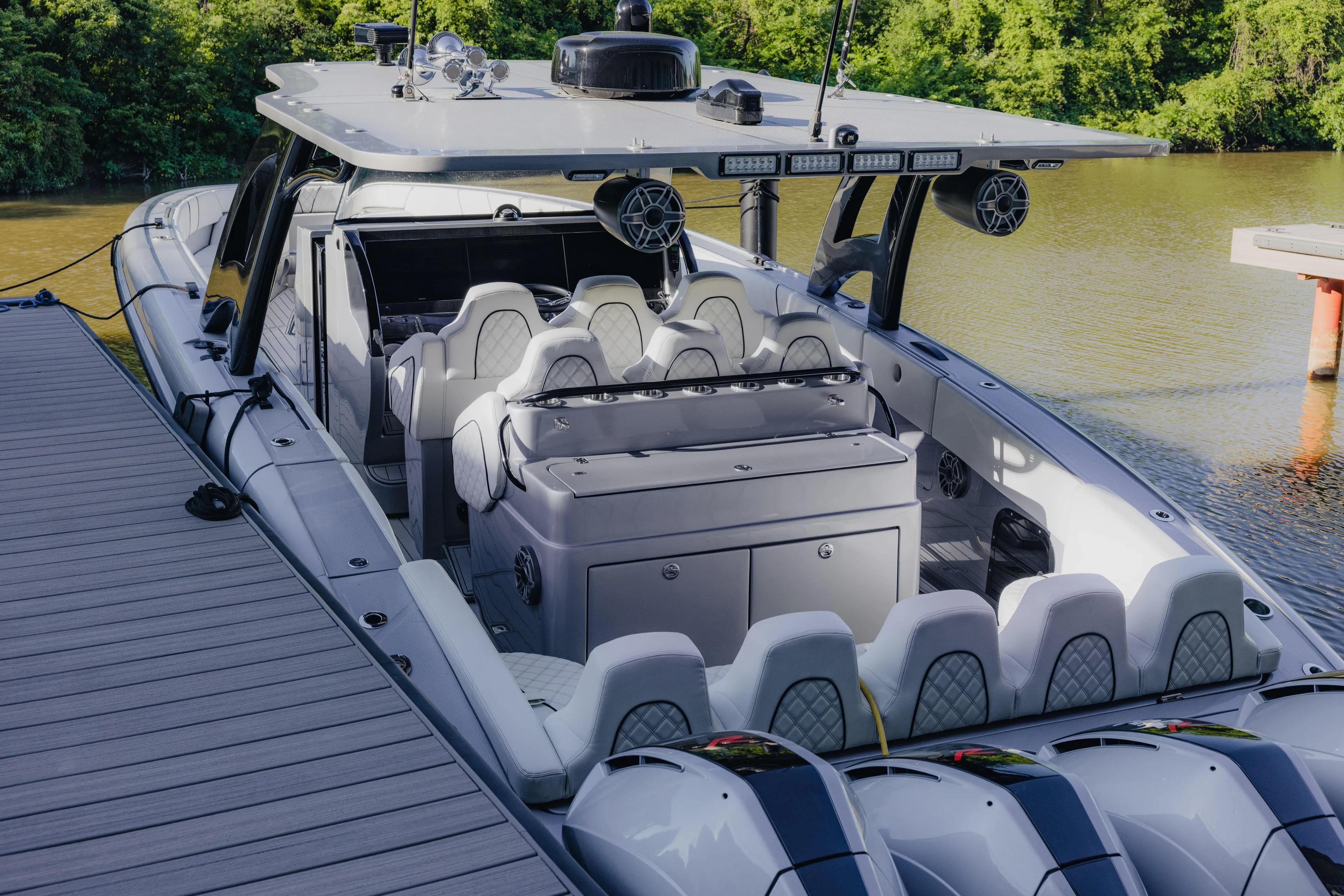  Yacht Photos Pics 2021 Midnight Express 43 Open boat docked, featuring luxurious seating and modern design.