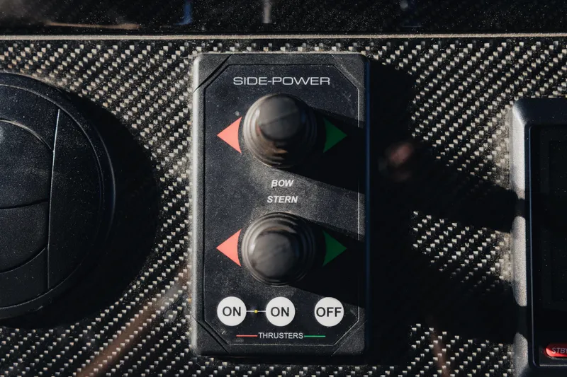  Yacht Photos Pics Control panel of a 2021 Midnight Express 43 Open boat with thruster switches.