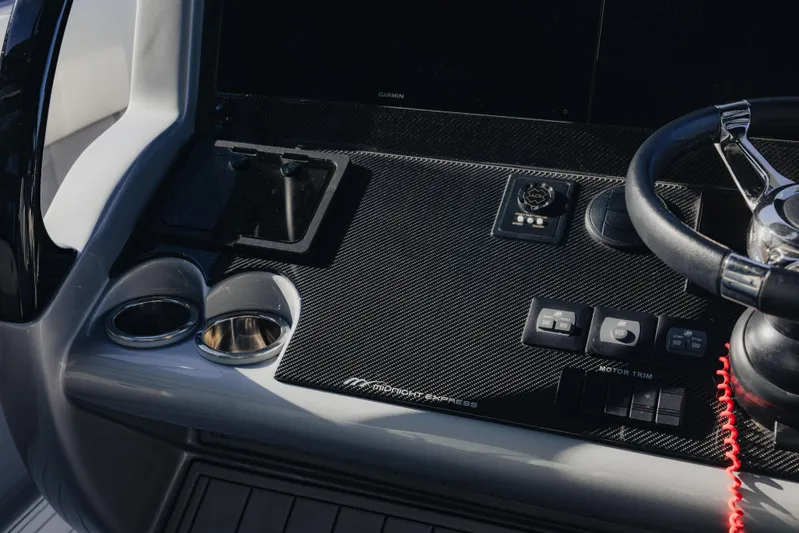  Yacht Photos Pics 2021 Midnight Express 43 Open dashboard with steering wheel and controls.