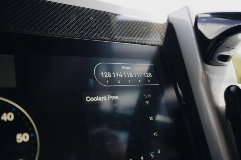  Yacht Photos Pics Dashboard of 2021 Midnight Express 43 Open showing engine hours and coolant pressure.