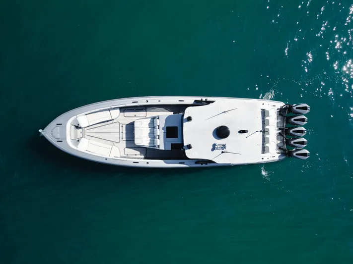  Yacht Photos Pics Aerial view of 2021 Midnight Express 43 Open boat on clear blue water.