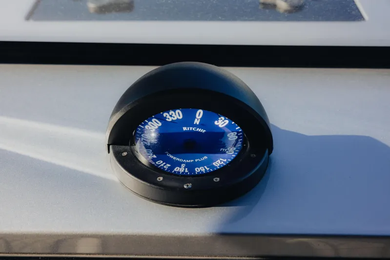  Yacht Photos Pics Compass on 2021 Midnight Express 43 Open boat dashboard, displaying navigation directions.