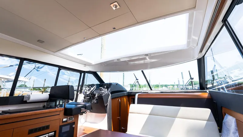  Yacht Photos Pics Interior of 2018 Jeanneau NC11 yacht with modern design and panoramic windows.