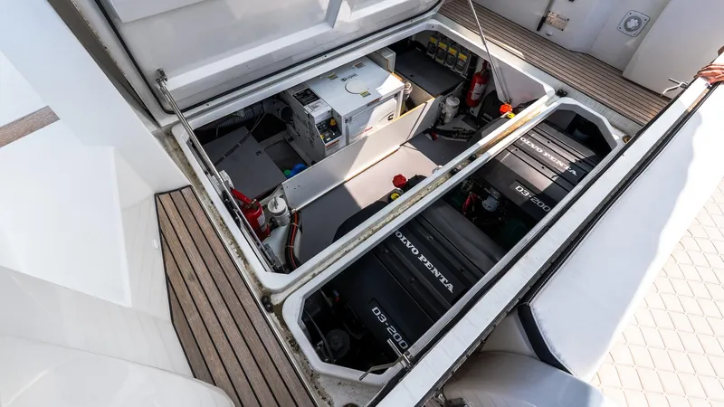  Yacht Photos Pics Engine compartment of 2018 Jeanneau NC11 boat with Volvo Penta engines and equipment.