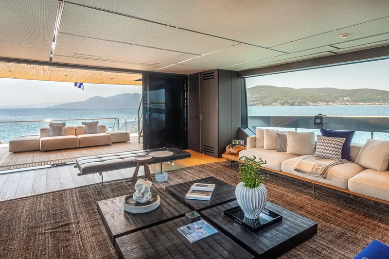 Just Marie 3 Yacht Photos Pics Luxurious interior of 2021 Sanlorenzo SX112 yacht with elegant seating and ocean view.