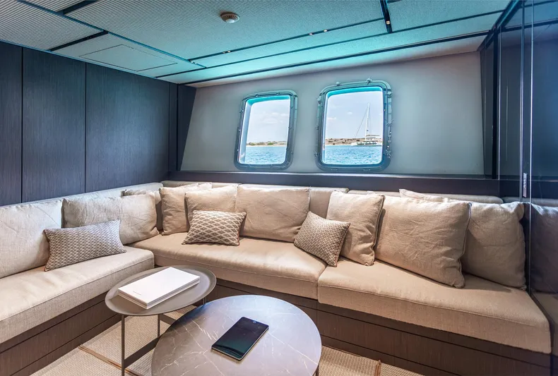 Just Marie 3 Yacht Photos Pics Luxurious interior of 2021 Sanlorenzo SX112 yacht with plush seating and ocean view.