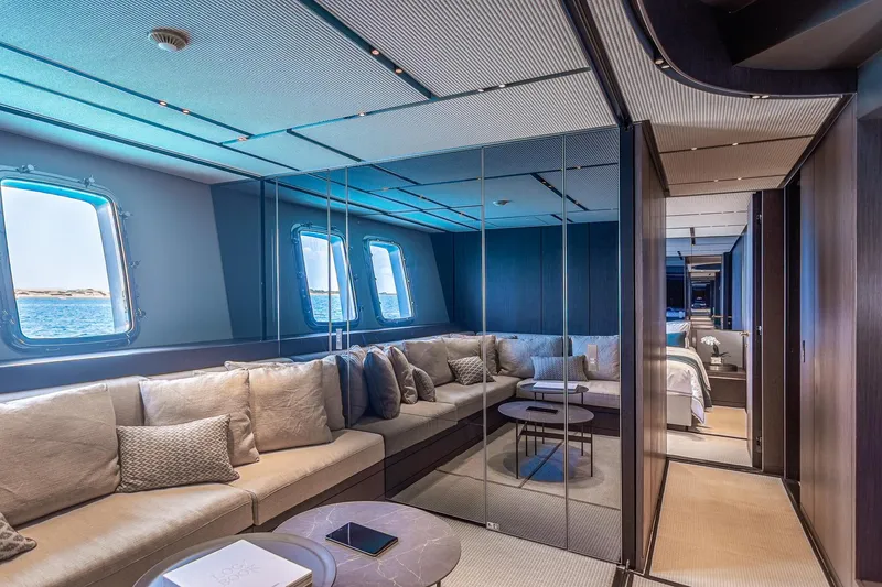 Just Marie 3 Yacht Photos Pics Luxurious interior of 2021 Sanlorenzo SX112 yacht with elegant seating and ocean view.