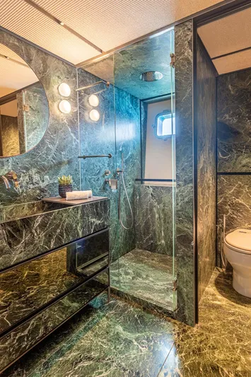 Just Marie 3 Yacht Photos Pics Luxurious bathroom with green marble design in 2021 Sanlorenzo SX112 yacht.