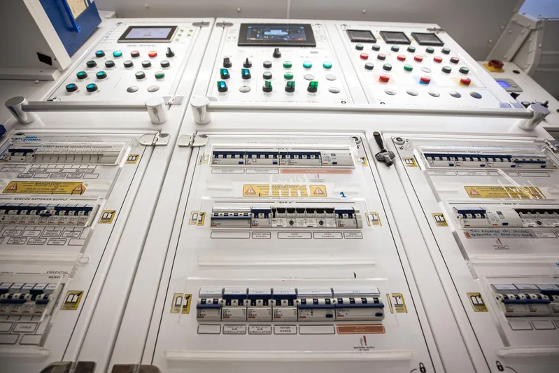 Just Marie 3 Yacht Photos Pics Control panel of a 2021 Sanlorenzo SX112 yacht, featuring switches and indicators.