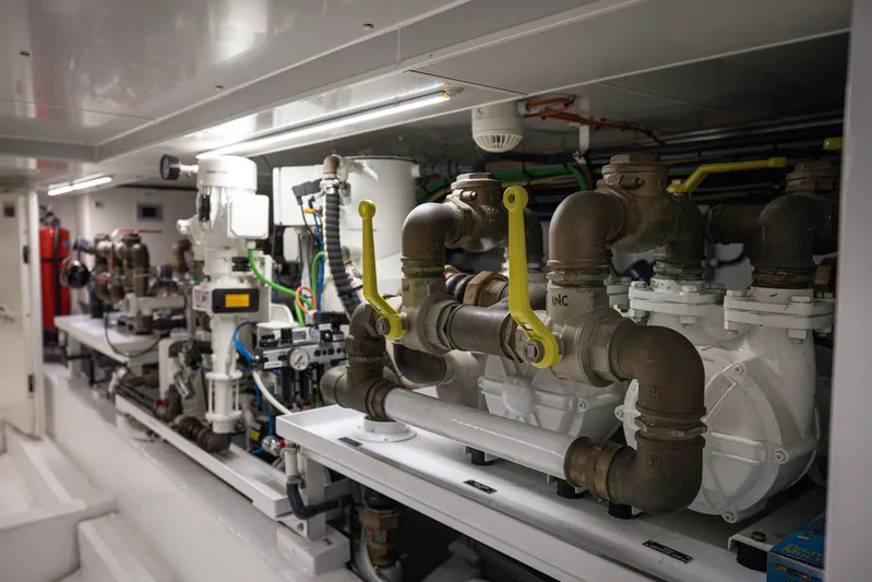 Just Marie 3 Yacht Photos Pics Engine room of 2021 Sanlorenzo SX112 yacht, showcasing complex machinery and piping systems.