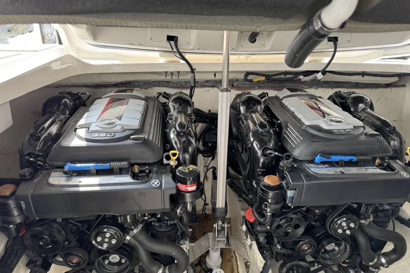  Yacht Photos Pics Twin engines of a 2024 Sea Ray SLX 350 boat, showcasing powerful performance.