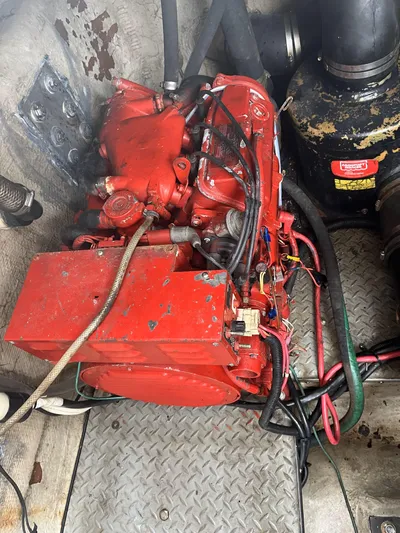  Yacht Photos Pics Red engine of a 2000 Regal Commodore 4160 boat, with visible wiring and components.