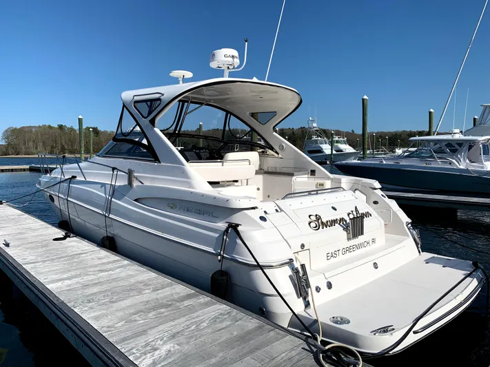 Sharon Ann Yacht Photos Pics 2007 Regal Commodore 3760 IB yacht docked at marina under clear blue sky.
