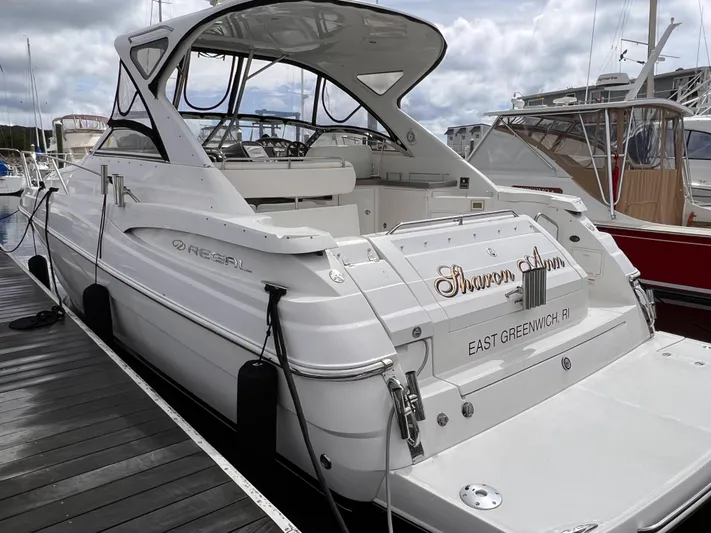 Sharon Ann Yacht Photos Pics 2007 Regal Commodore 3760 IB yacht docked at marina, rear view.