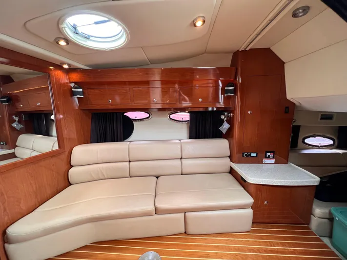 Sharon Ann Yacht Photos Pics Luxurious interior of 2007 Regal Commodore 3760 IB yacht with leather seating and wood accents.