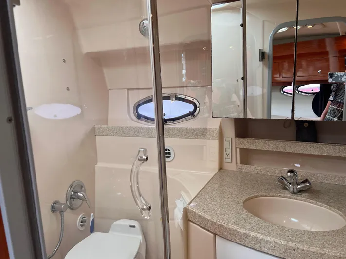 Sharon Ann Yacht Photos Pics 2007 Regal Commodore 3760 IB bathroom with sink, toilet, and shower.