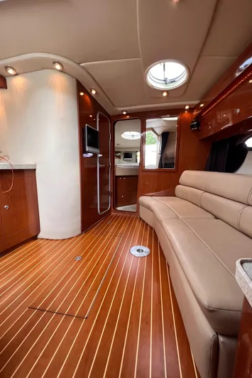Sharon Ann Yacht Photos Pics Luxurious interior of 2007 Regal Commodore 3760 IB yacht with elegant wood flooring.