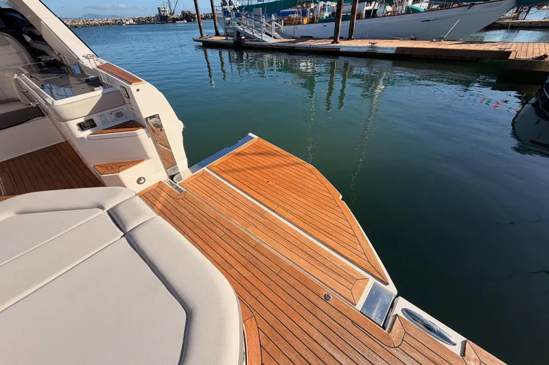  Yacht Photos Pics 2021 Sea Ray SLX 400 yacht with teak deck at marina.