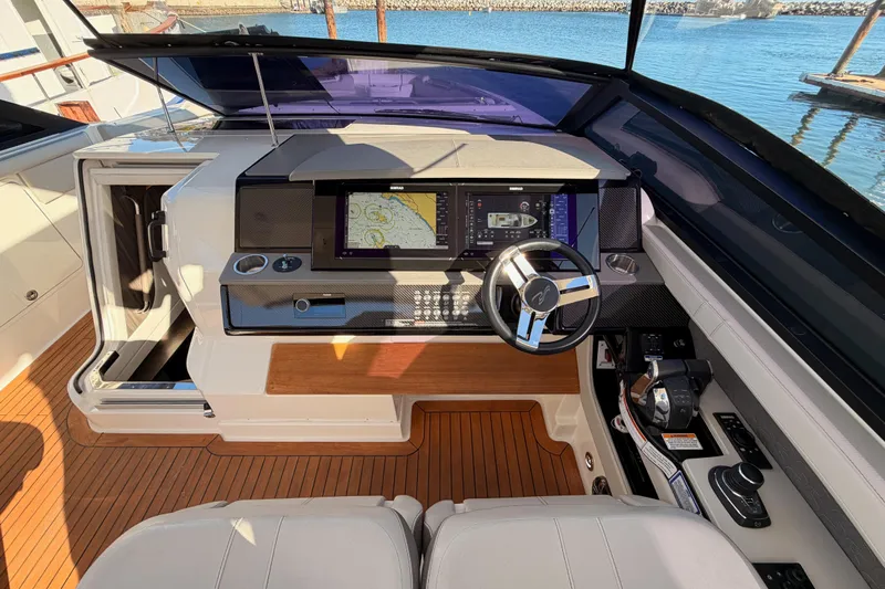  Yacht Photos Pics 2021 Sea Ray SLX 400 helm with advanced navigation system and luxurious interior design.