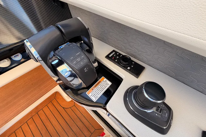  Yacht Photos Pics Control panel of 2021 Sea Ray SLX 400 boat with joystick and throttle.