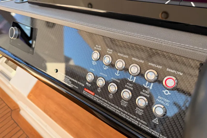  Yacht Photos Pics Control panel of 2021 Sea Ray SLX 400 boat with various function buttons.