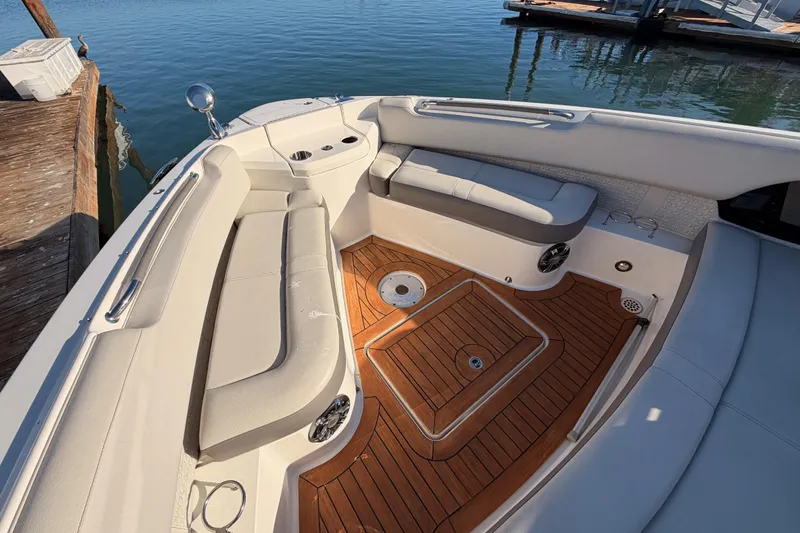  Yacht Photos Pics Luxurious 2021 Sea Ray SLX 400 boat interior with elegant seating and teak flooring.