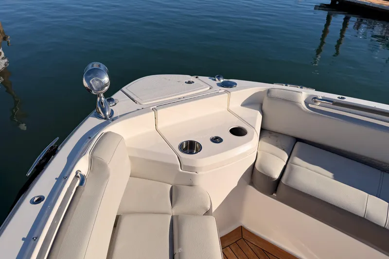  Yacht Photos Pics Luxurious seating area on 2021 Sea Ray SLX 400 boat, featuring cup holders and elegant design.