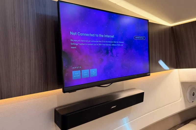  Yacht Photos Pics Flat-screen TV and soundbar in 2021 Sea Ray SLX 400 boat interior.