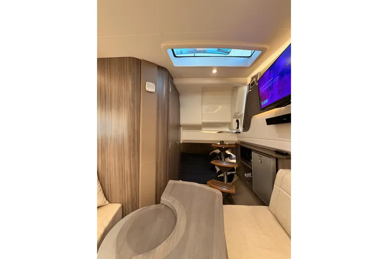  Yacht Photos Pics Luxurious interior of 2021 Sea Ray SLX 400 yacht with modern amenities and stylish design.