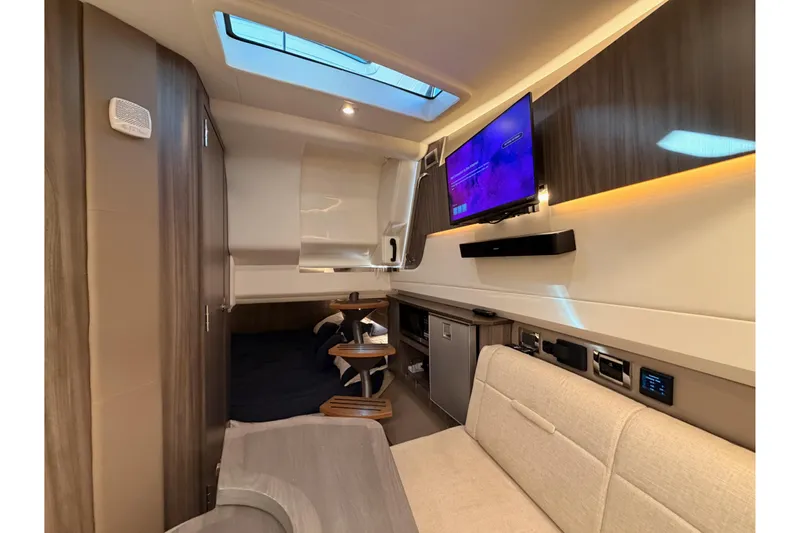  Yacht Photos Pics Luxurious interior of 2021 Sea Ray SLX 400 yacht with modern amenities and elegant design.