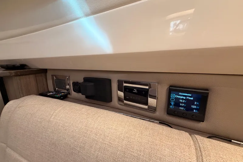  Yacht Photos Pics Interior control panel of 2021 Sea Ray SLX 400 boat, featuring electronic displays and controls.