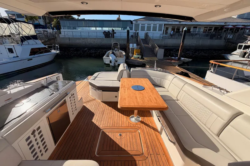  Yacht Photos Pics Luxurious 2021 Sea Ray SLX 400 yacht interior with elegant seating and wooden deck.