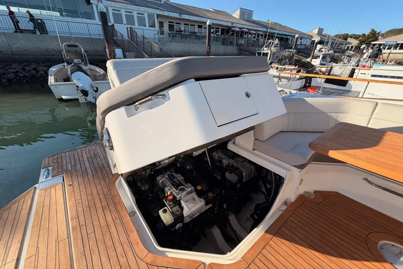  Yacht Photos Pics 2021 Sea Ray SLX 400 boat with open engine compartment at dock.