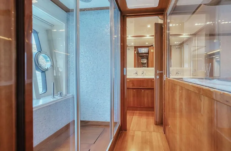 Lidia Yacht Photos Pics Luxurious interior of 2006 Ferretti Yachts 830, featuring elegant wood finishes and modern design.