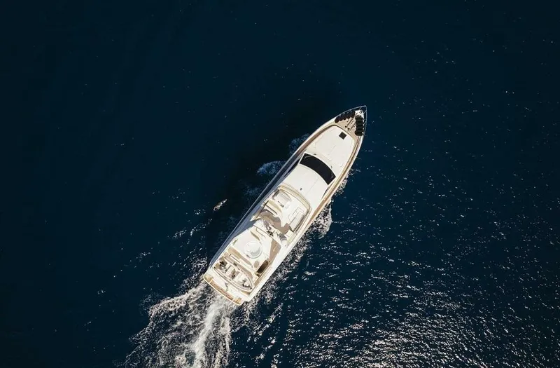 Lidia Yacht Photos Pics Aerial view of 2006 Ferretti Yachts 830 cruising on open water.