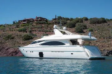 Lidia Yacht Photos Pics 2006 Ferretti Yachts 830 cruising near a scenic coastal landscape.