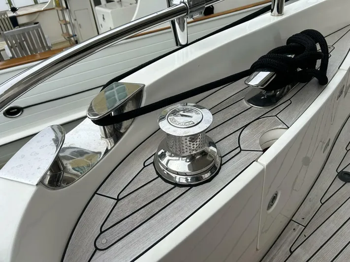 Uniq III Yacht Photos Pics 2008 Princess 67 Flybridge yacht deck with winch and cleat details.