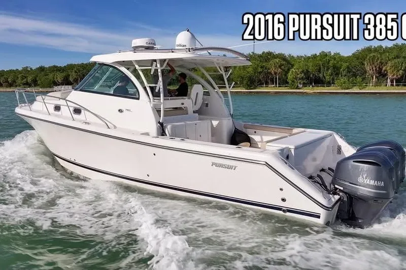  Yacht Photos Pics 2016 Pursuit OS 385 Offshore boat cruising on water with Yamaha engines.