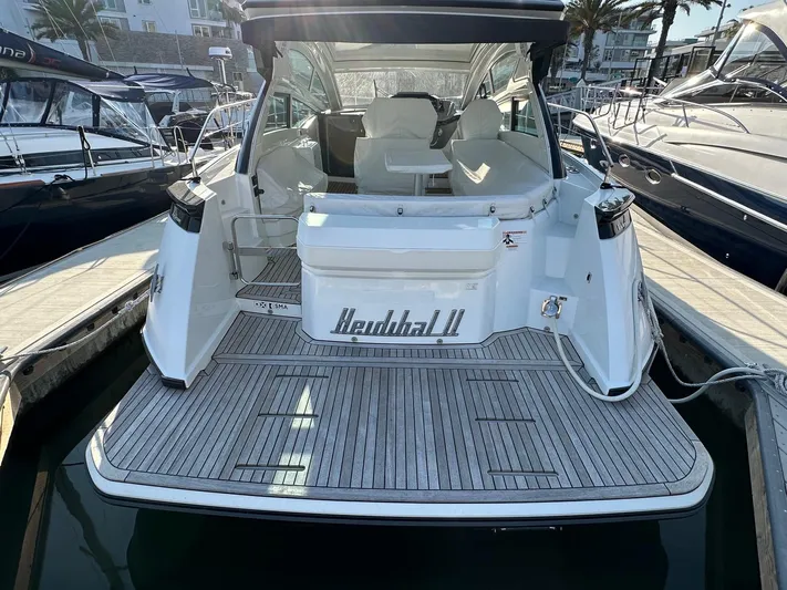 Heidibal 11 Yacht Photos Pics 2021 Beneteau Gran Turismo 40 yacht docked at marina, rear view.