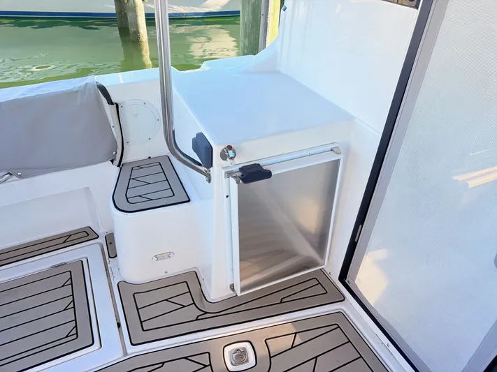 Reliance Yacht Photos Pics Interior of 2023 Cutwater 32 Coupe featuring stylish flooring.