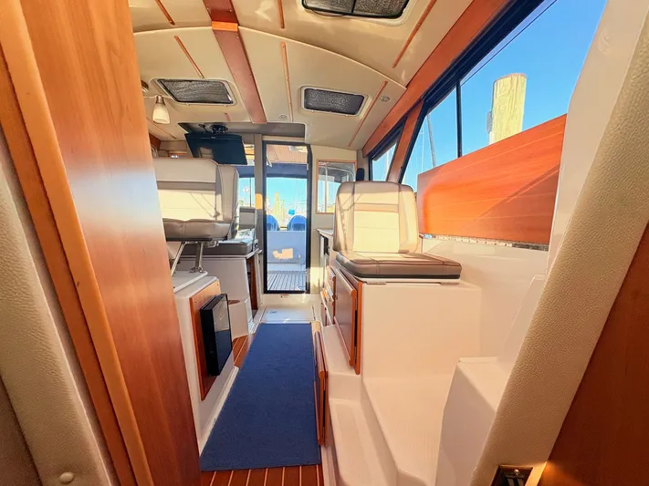 Reliance Yacht Photos Pics Interior of 2023 Cutwater 32 Coupe with modern amenities.