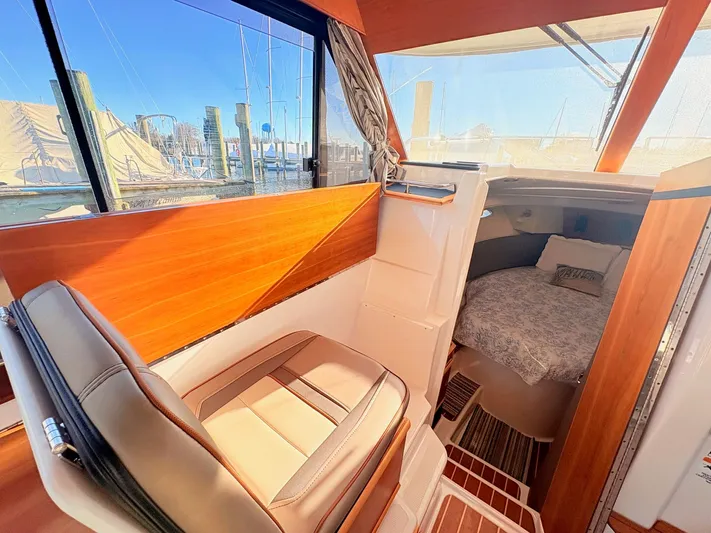 Reliance Yacht Photos Pics Interior of 2023 Cutwater 32 Coupe featuring cozy cabin.