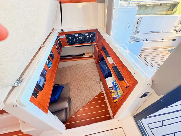 Reliance Yacht Photos Pics Interior of 2023 Cutwater 32 Coupe with controls and storage.