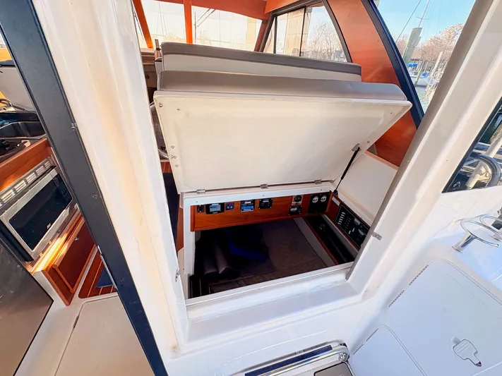 Reliance Yacht Photos Pics Interior of 2023 Cutwater 32 Coupe with control console.