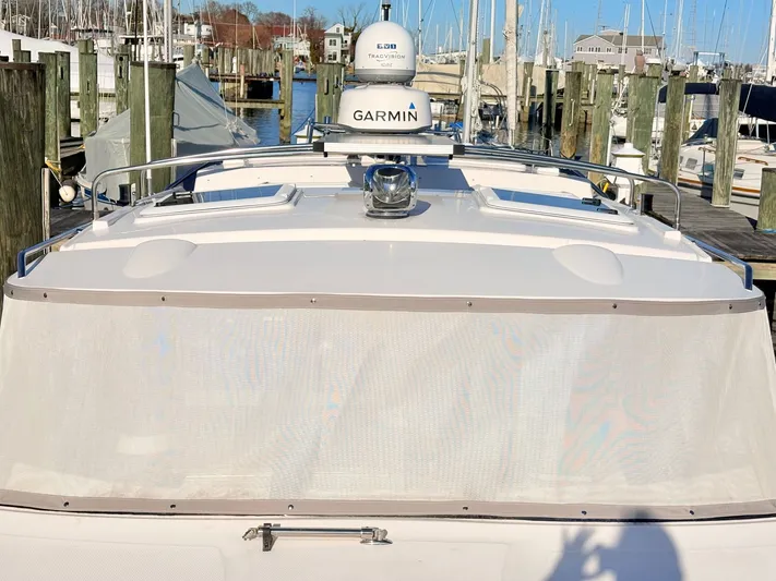 Reliance Yacht Photos Pics 2023 Cutwater 32 Coupe boat docked with Garmin equipment.