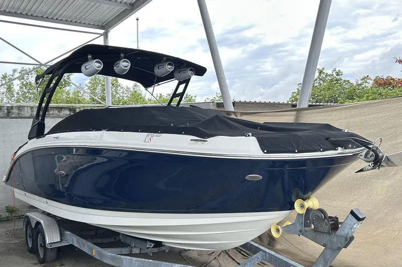 2022 Sea Ray 290 Sdx @ Cancun "angulo" Yacht Photos Pics 2022 Sea Ray SDX 290 boat on trailer under shelter, covered and ready for transport.