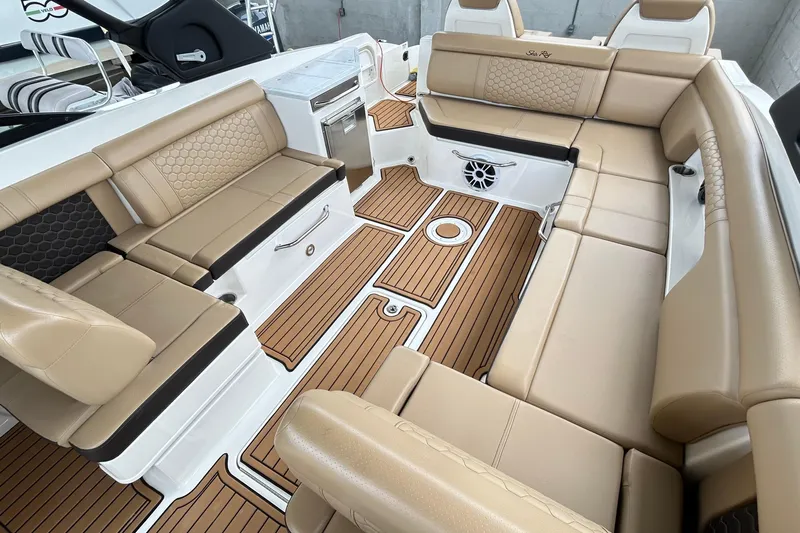 2022 Sea Ray 290 Sdx @ Cancun "angulo" Yacht Photos Pics Luxurious 2022 Sea Ray SDX 290 boat interior with tan seating and wood-style flooring.