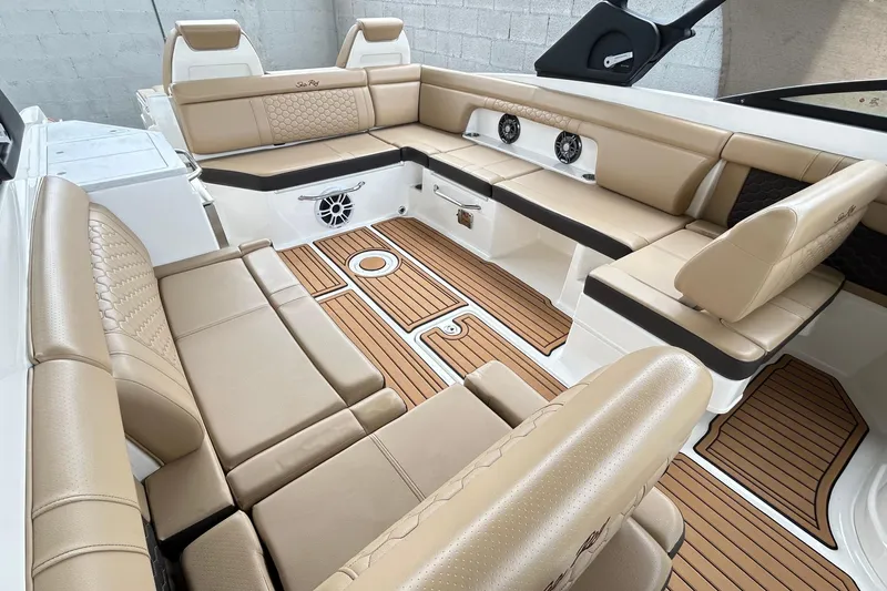 2022 Sea Ray 290 Sdx @ Cancun "angulo" Yacht Photos Pics Luxurious interior of 2022 Sea Ray SDX 290 boat with tan seating and wood flooring.